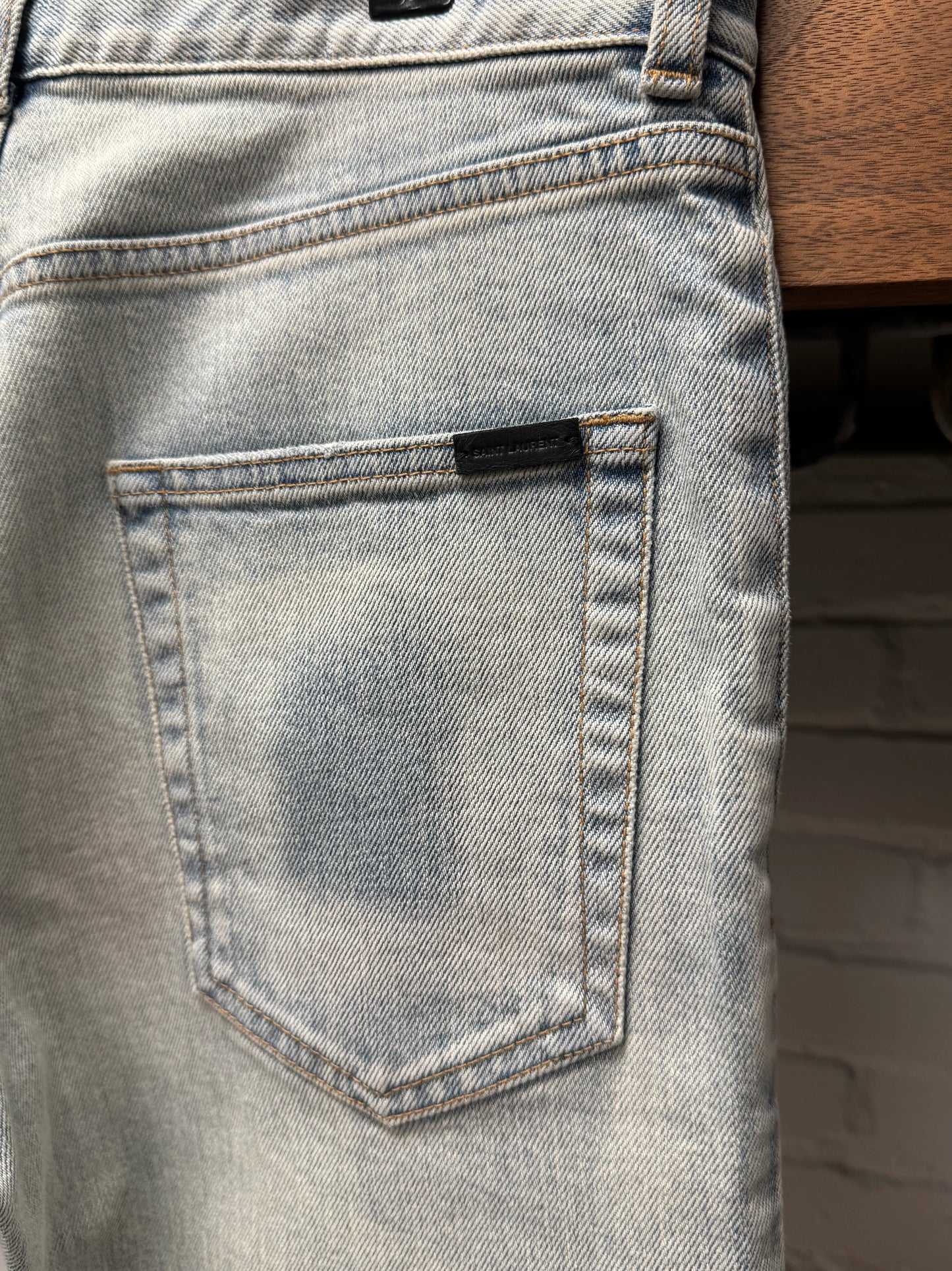 2021 Saint Laurent ‘D02’ Light Wash Distressed Skinny Jeans