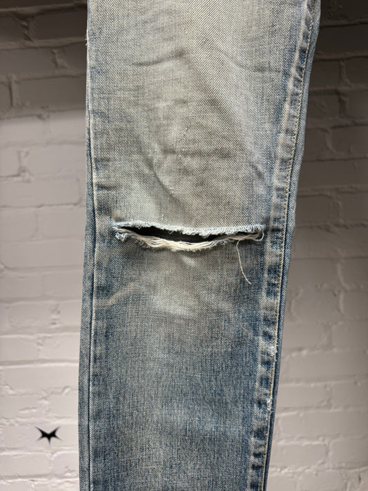 Saint Laurent ‘D02’ Distressed Light Wash Blue Denim