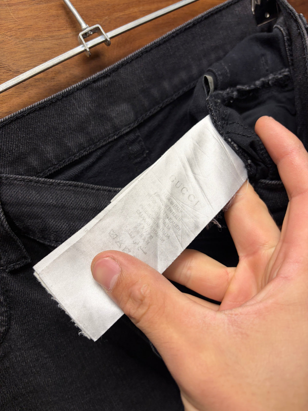 Gucci Faded Black Skinny Jeans with Leather Jacron Patch