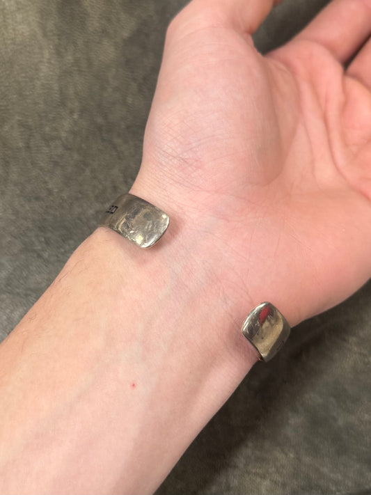 Undercover ‘Secrets’ Silver Bangle Bracelet