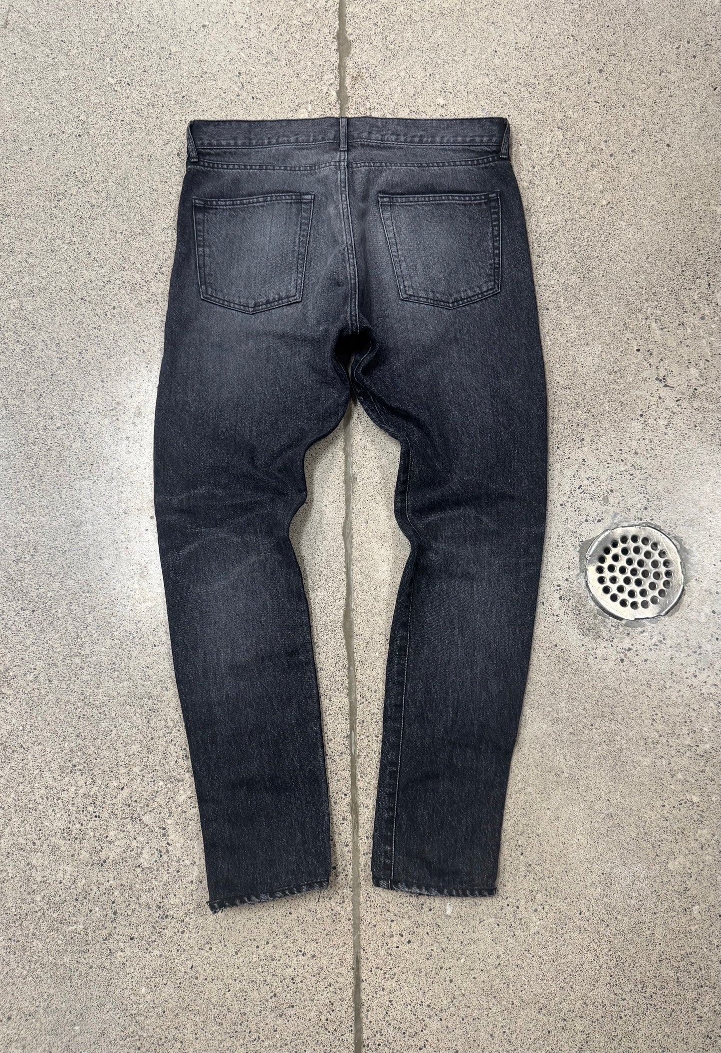 Saint Laurent ‘D01’ Distressed Black Skinny Jeans