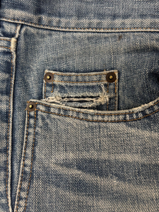 Saint Laurent ‘D02’ Distressed Blue Skinny Jeans
