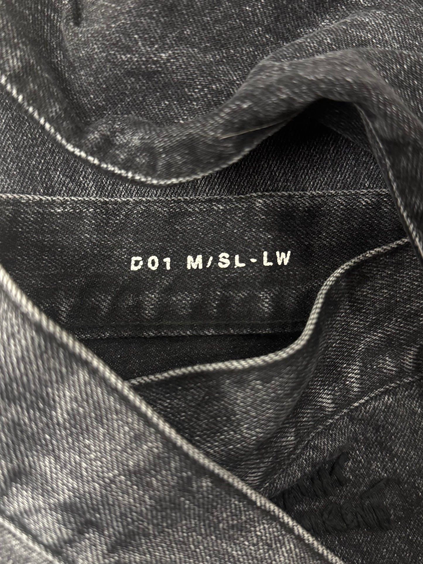 Saint Laurent ‘D01’ Distressed Black Skinny Jeans