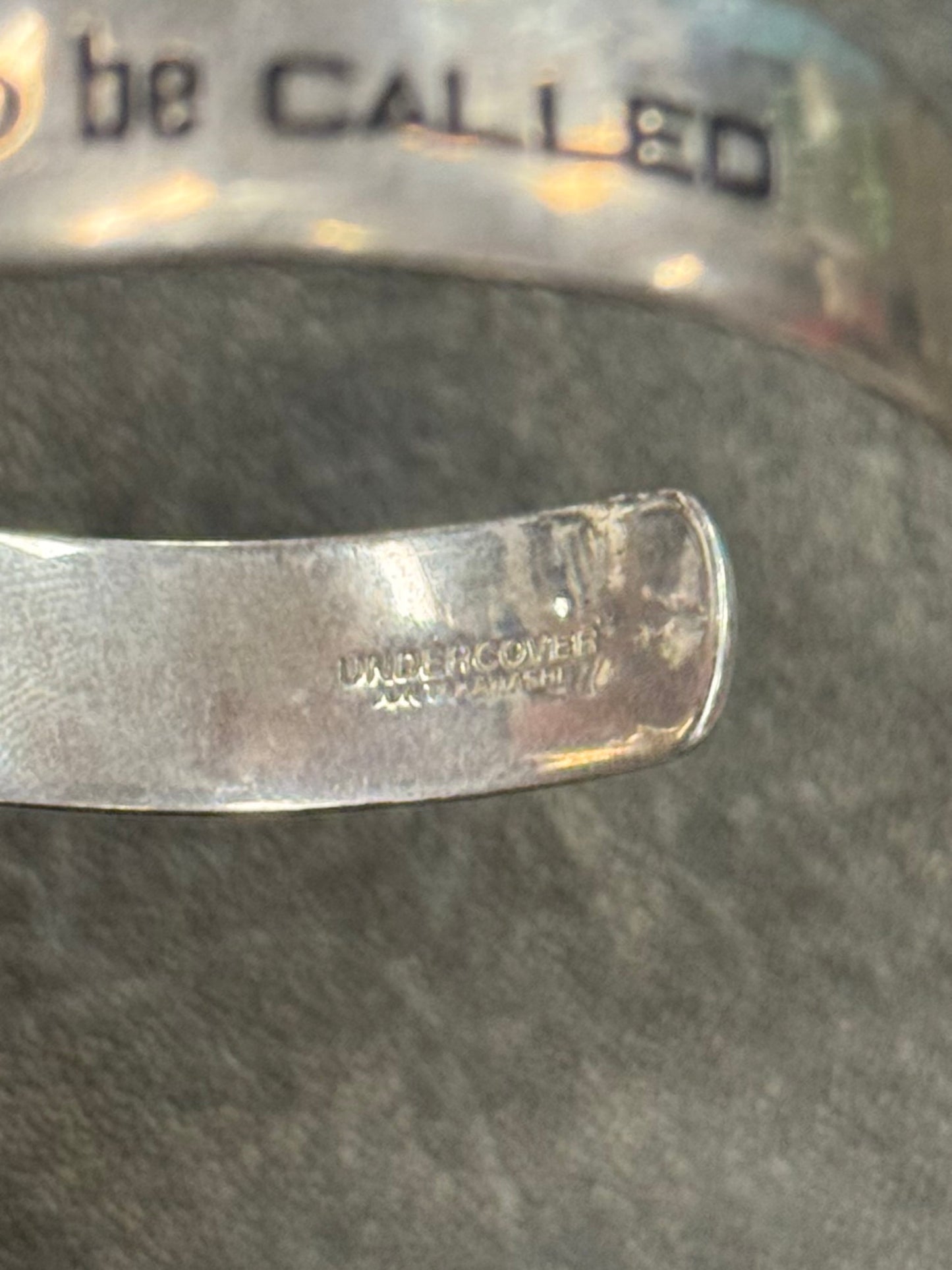 Undercover ‘Secrets’ Silver Bangle Bracelet