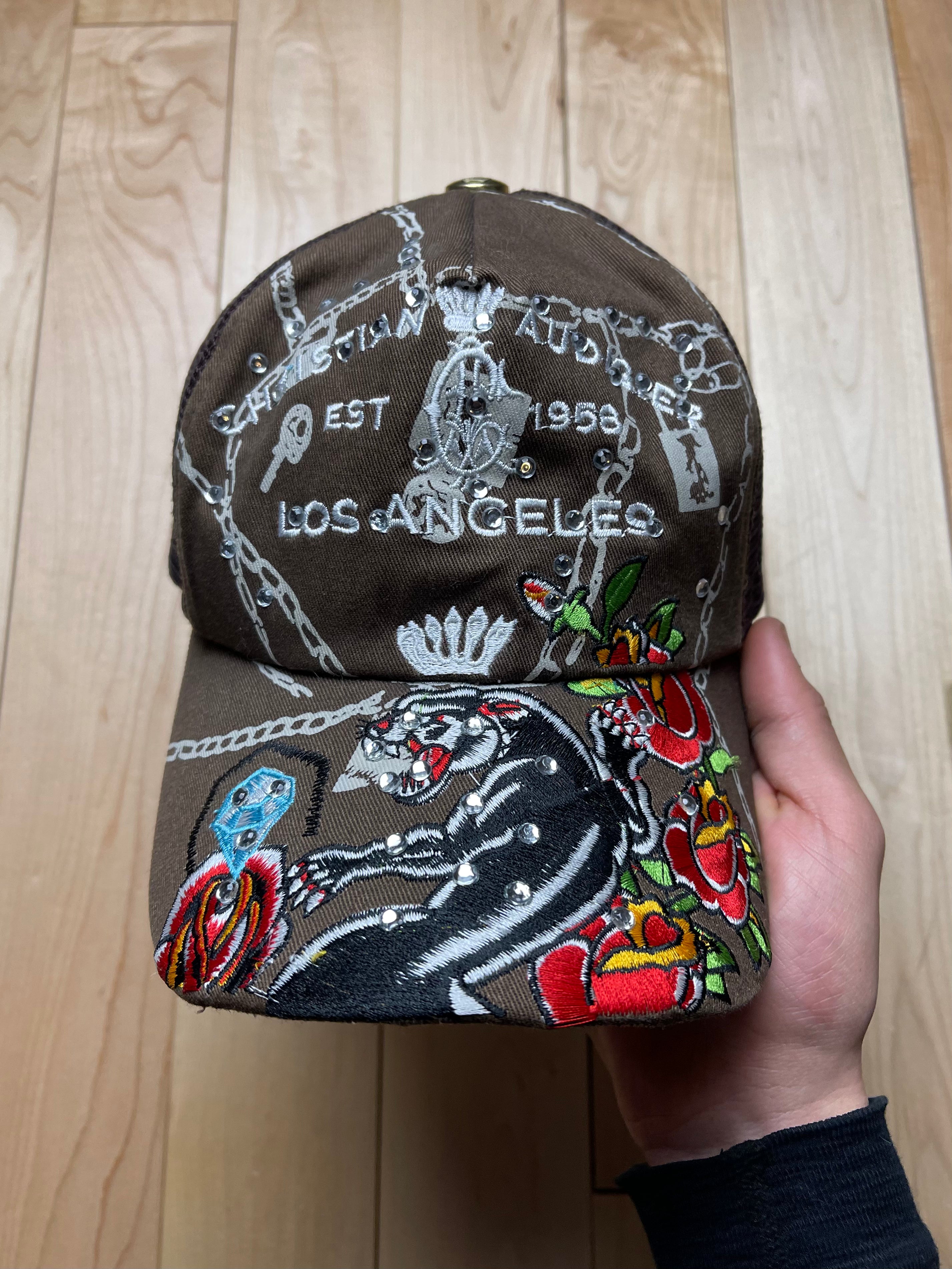 Christian audigier hat online