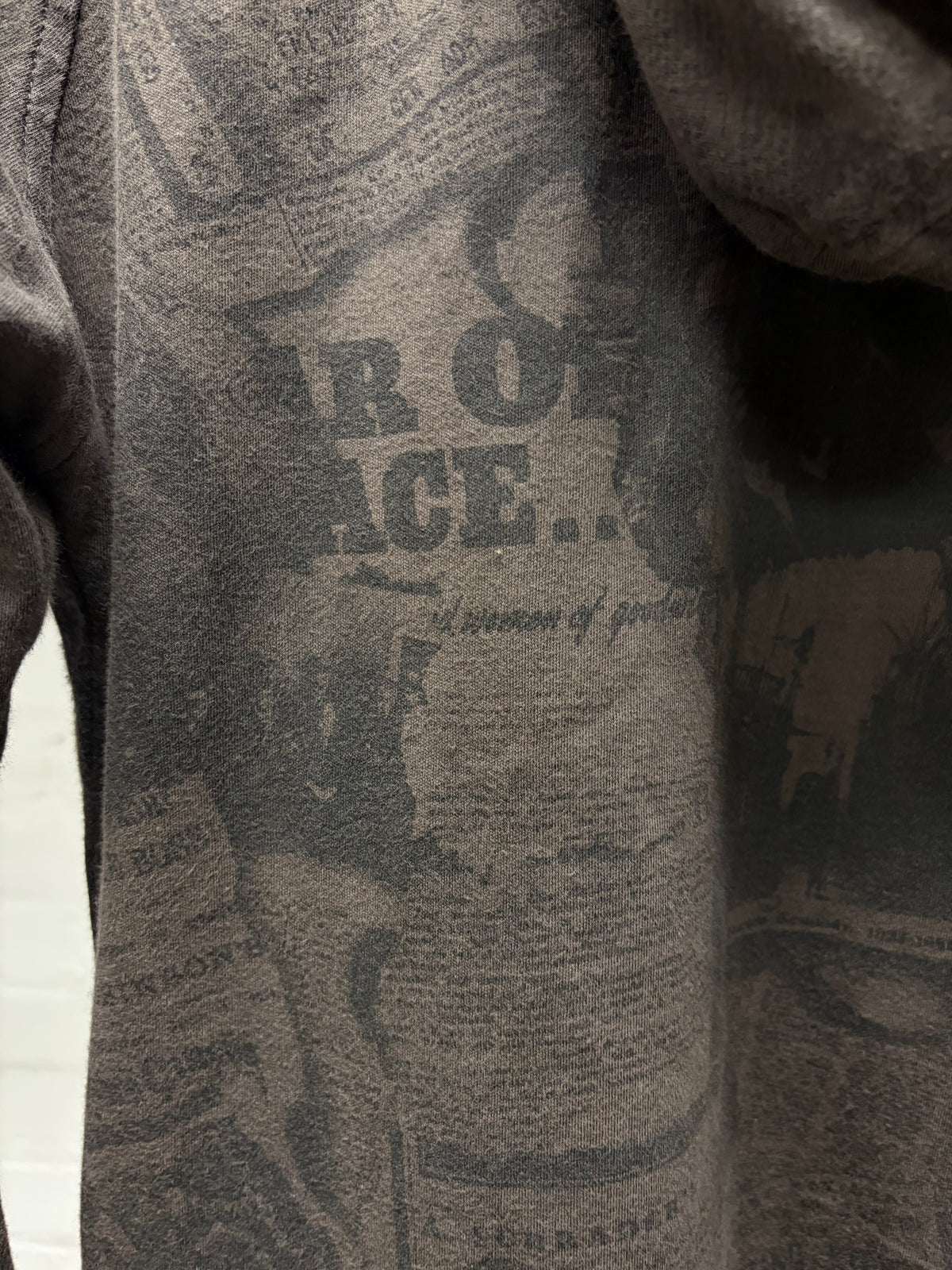 14th Addiction ‘Newspaper Print’ Zip Up Hoodie with Leather Tassels
