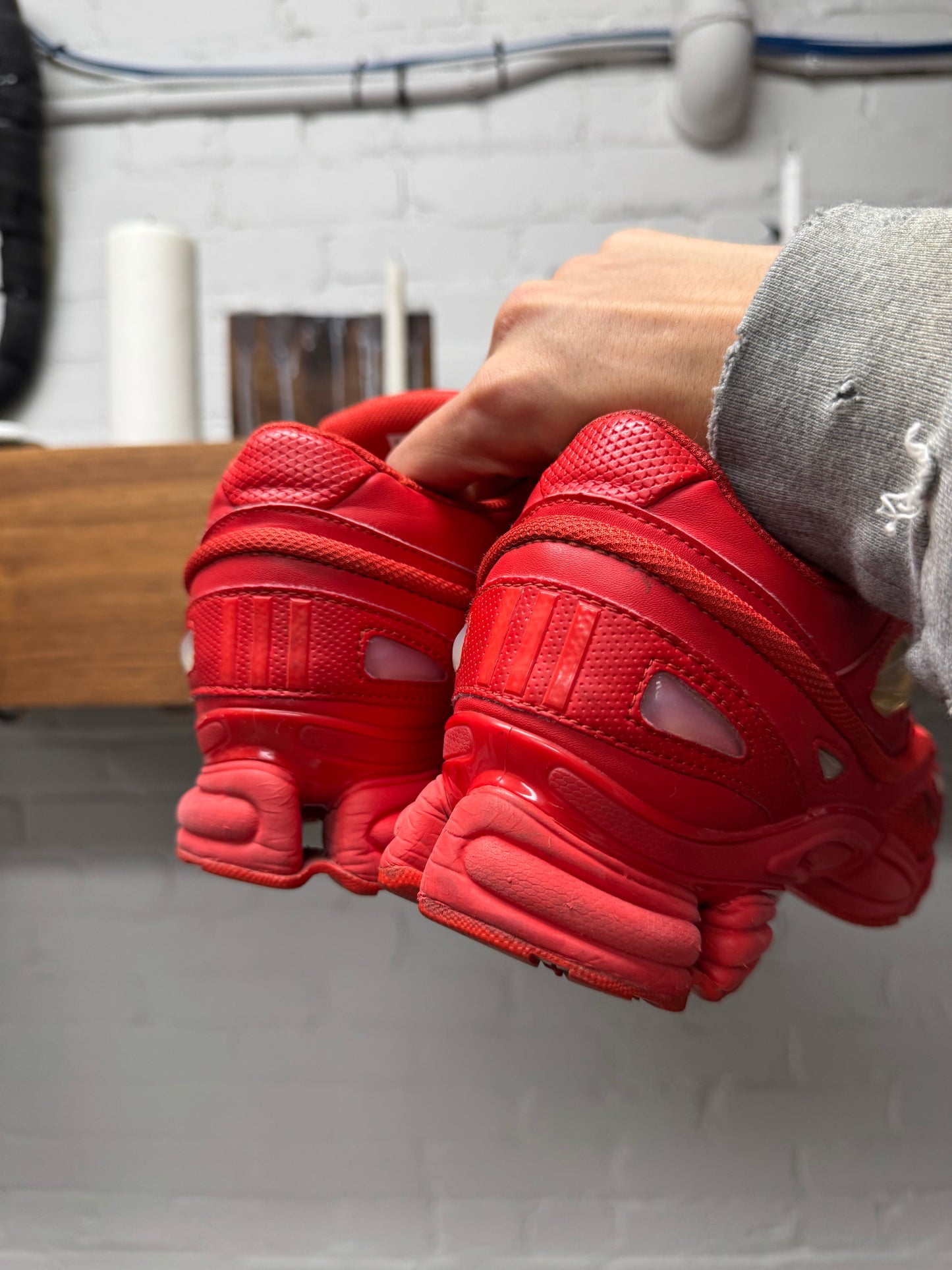 Raf Simons ‘Ozweegos V2’ Red Low Top Sneakers