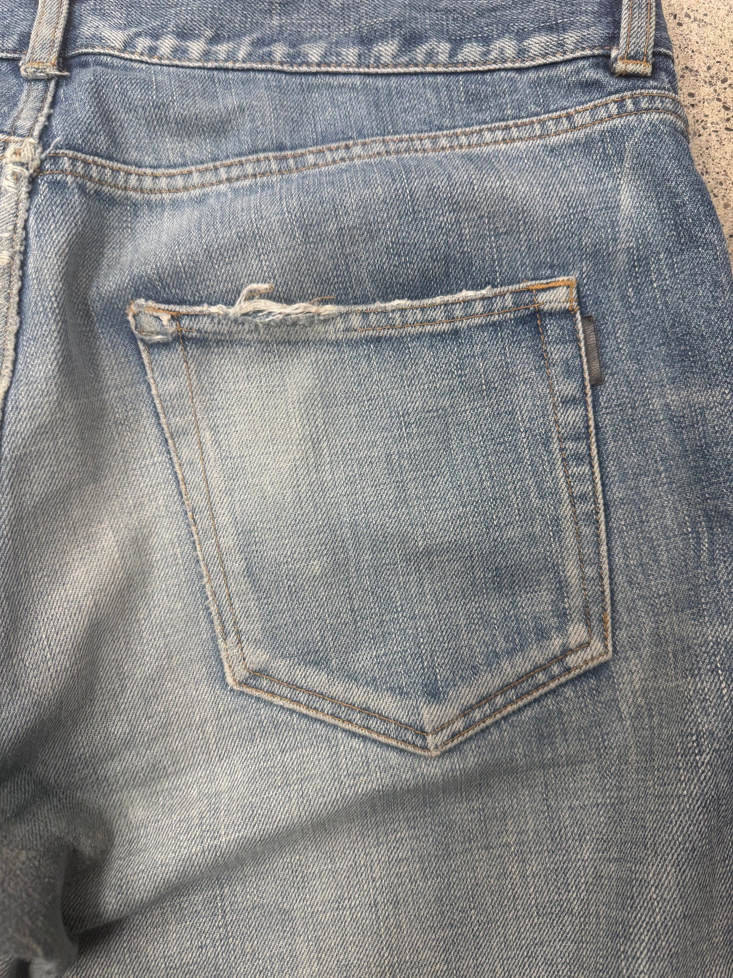 Saint Laurent ‘D02’ Distressed Blue Skinny Jeans
