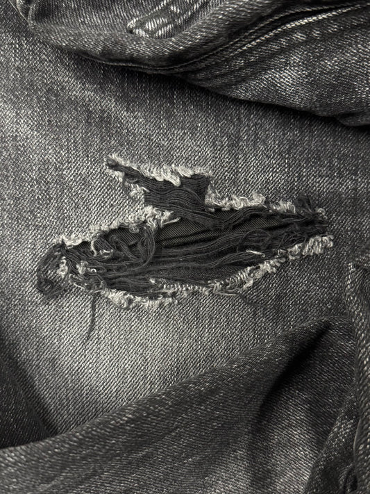 Saint Laurent ‘D01’ Distressed Black Skinny Jeans