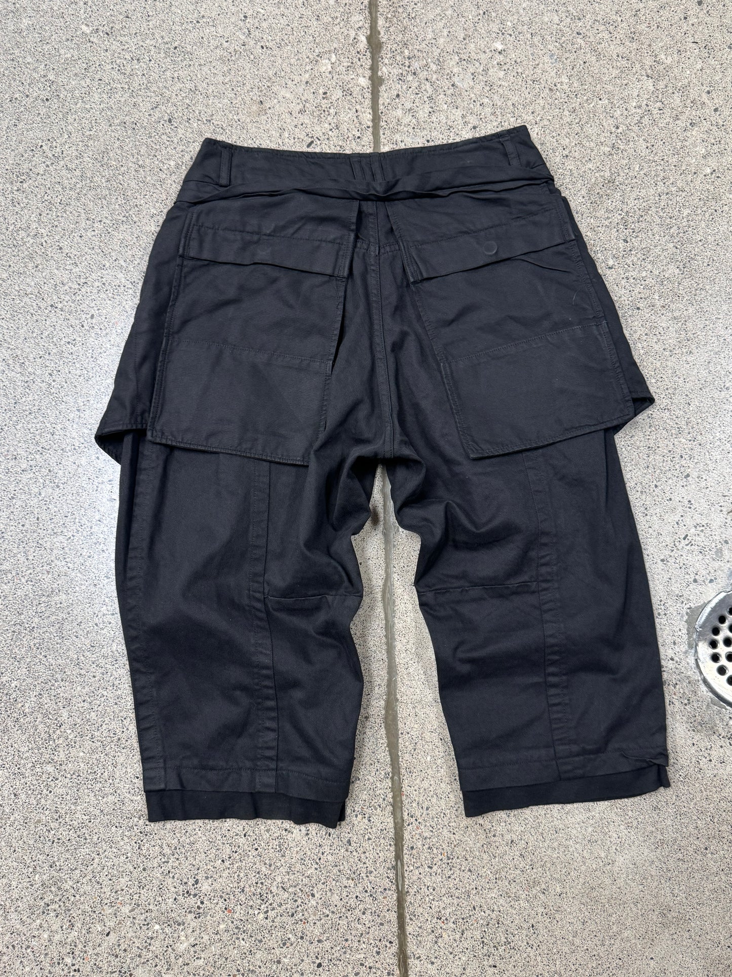 AW2013 Julius ‘Exposed Pocket’ Waxed Black Cargo Shorts