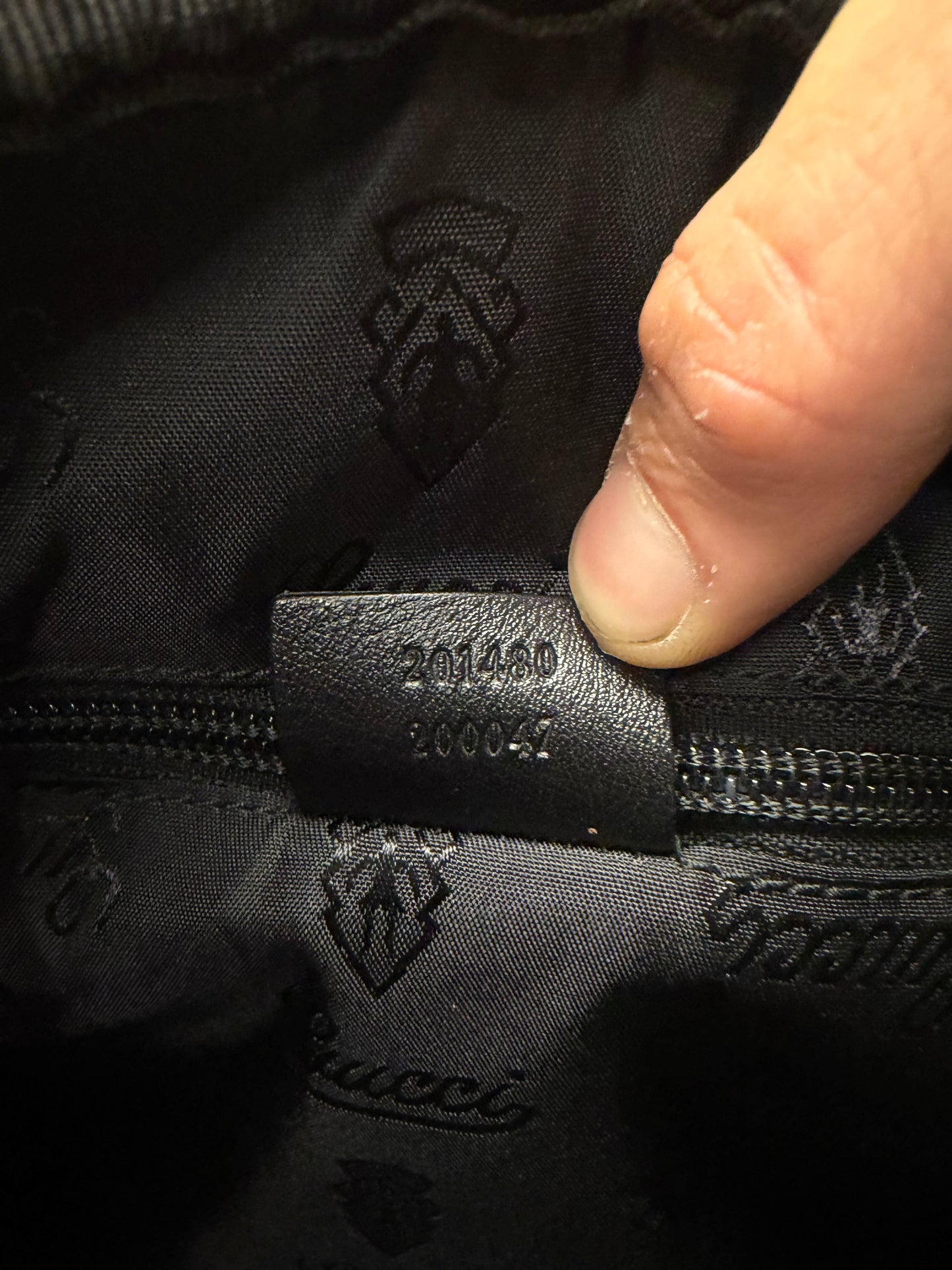 Gucci ‘Guccissima’ Embossed Monogram Black Leather Business Bag