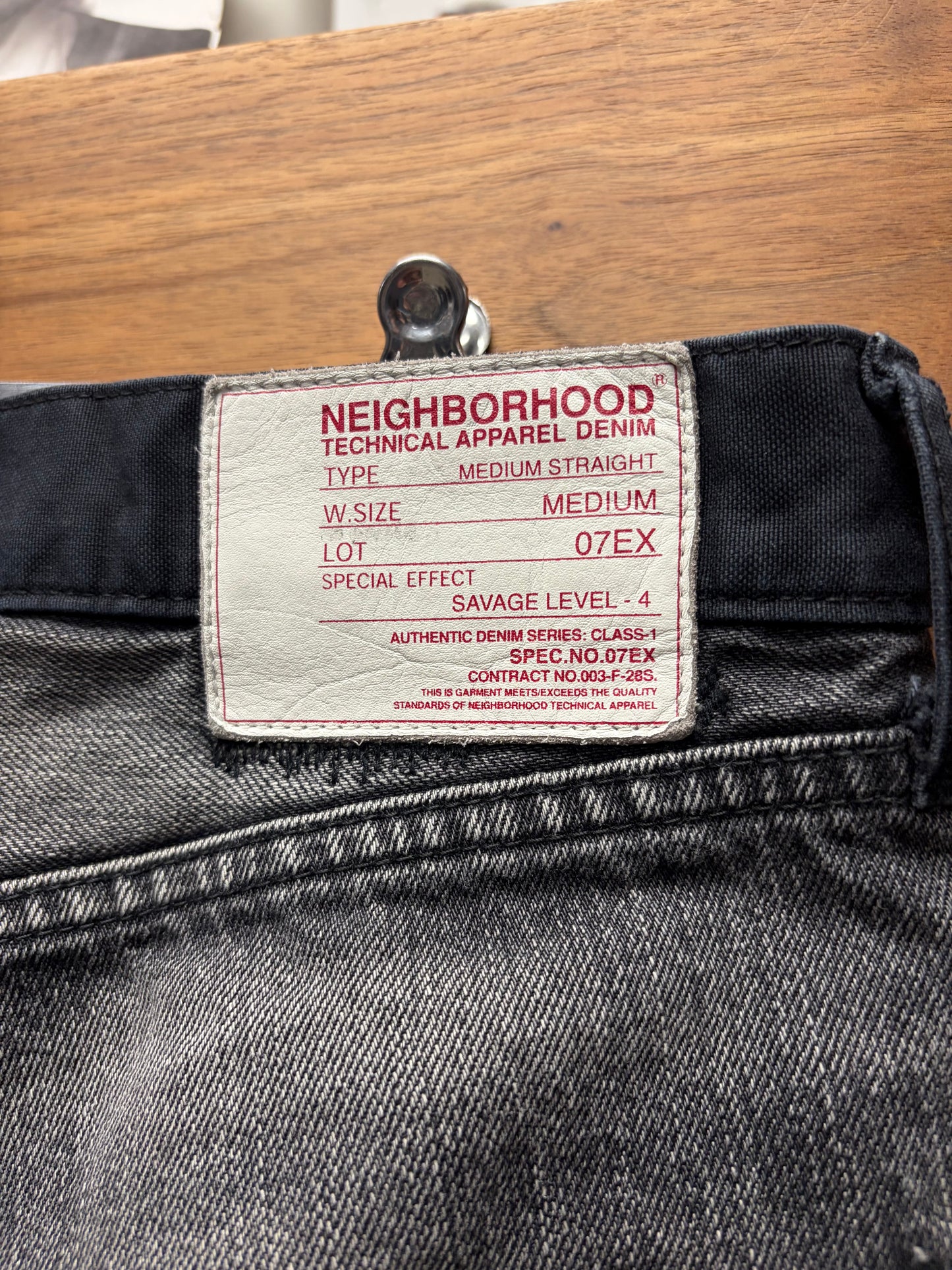 Neighborhood Patchwork Distressed Black Bootcut Denim