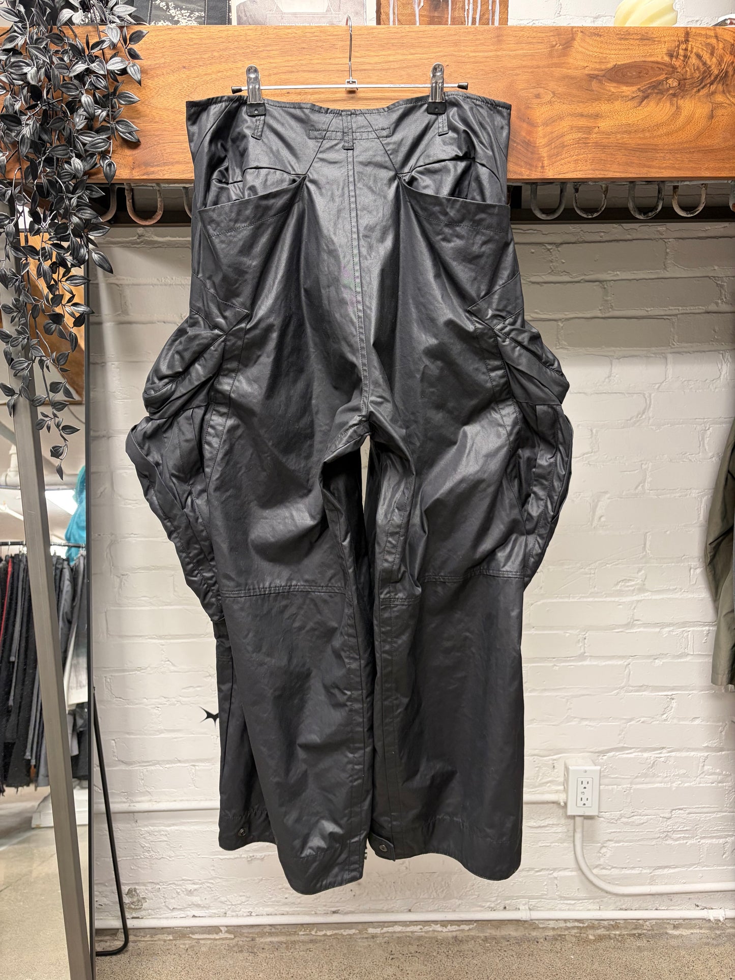 AW2022 Julius ‘Gas Mask’ Waxed Black Wide Leg Cargo Pants