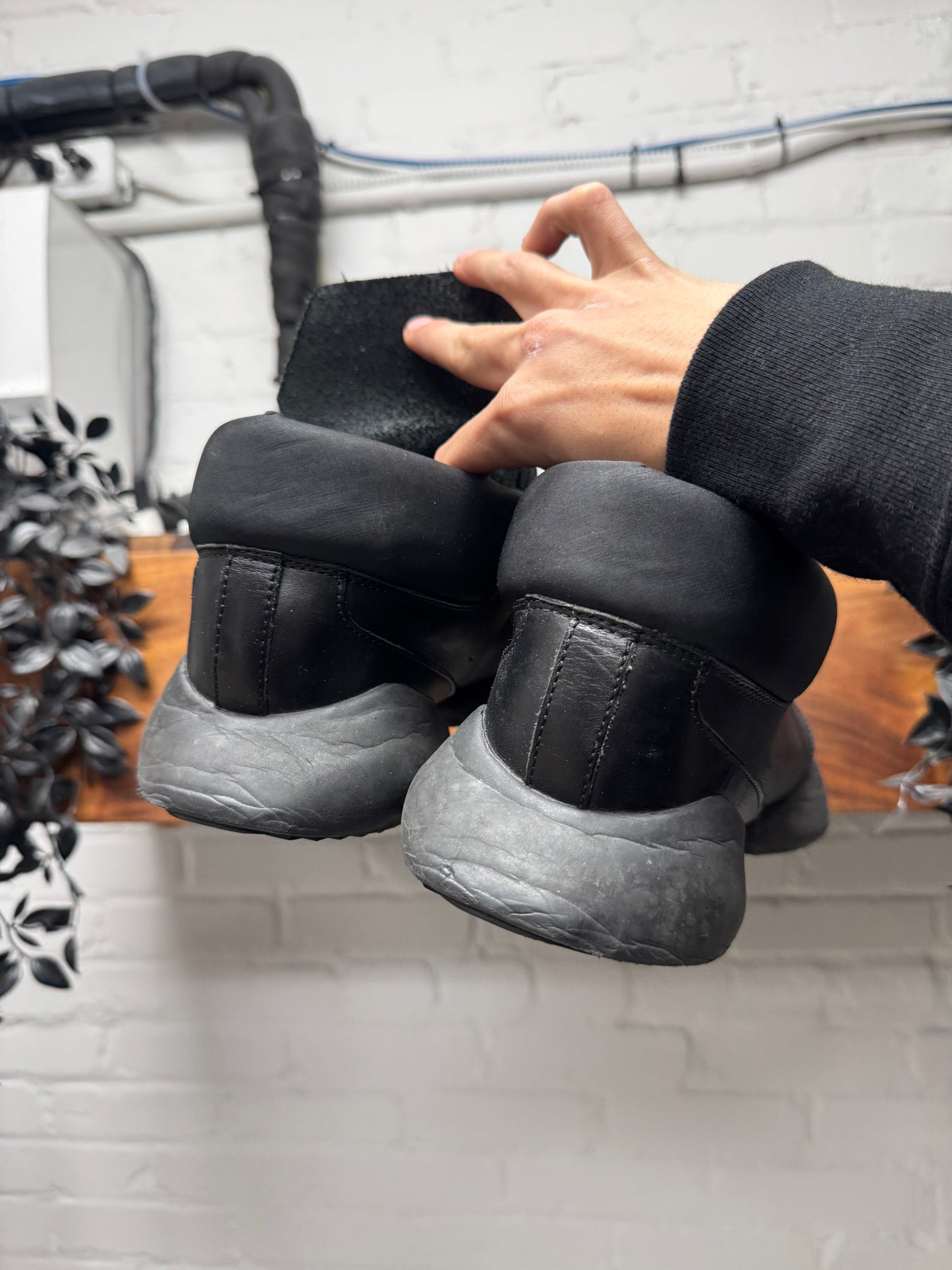 Rick Owens x Adidas ‘Vicious’ Black Leather Tech Runners.