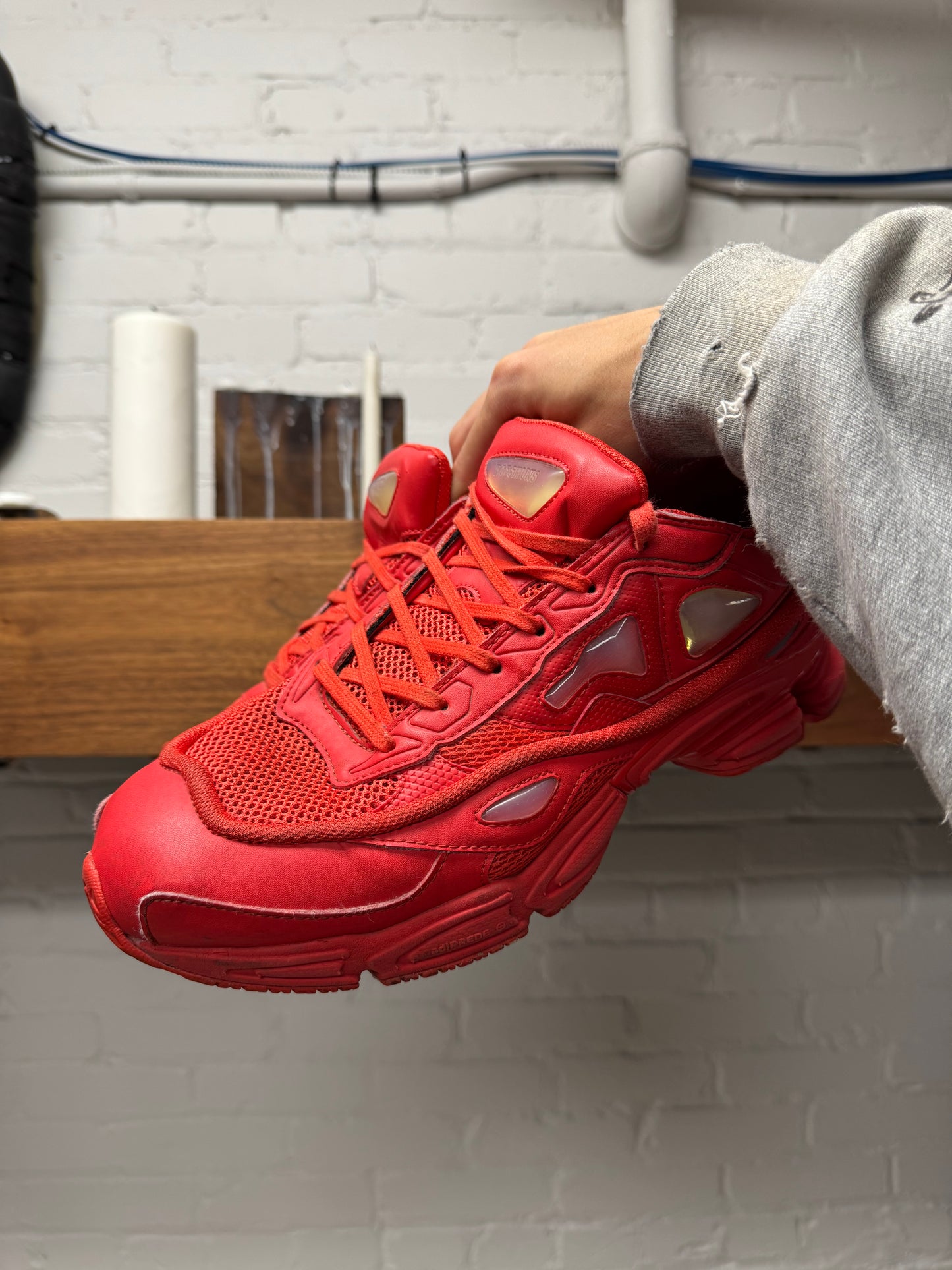 Raf Simons ‘Ozweegos V2’ Red Low Top Sneakers