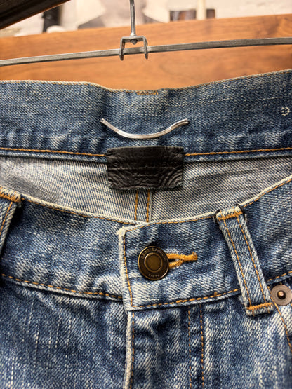 2018 Saint Laurent ‘D02’ Distressed Blue ‘Knee-Rip’ Skinny Jeans