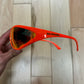 Balenciaga Xpander Orange Tinted Wraparound Sunglasses