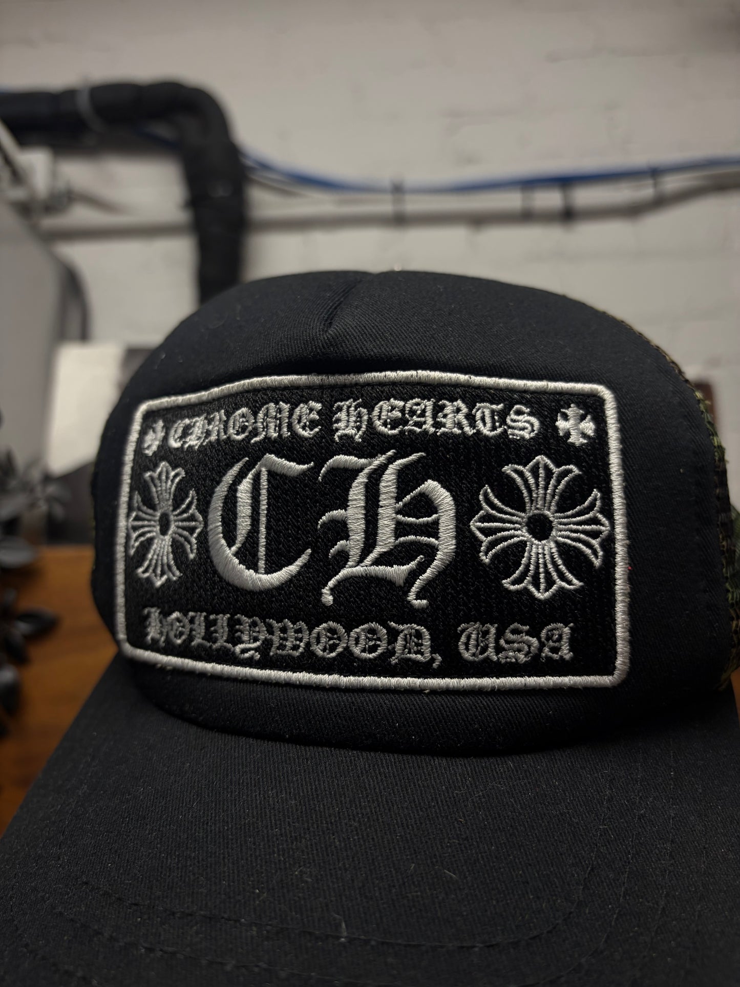 Chrome Hearts ‘Hollywood’ Store Exclusive Black/Camo Trucker Hat