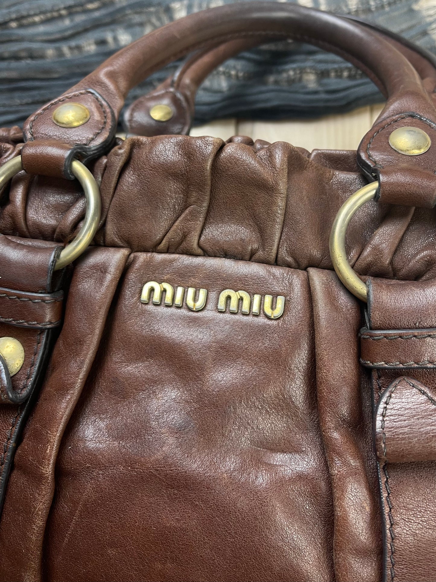 Miu Miu Brown Leather Top Handle Bag – Alex Maxamenko