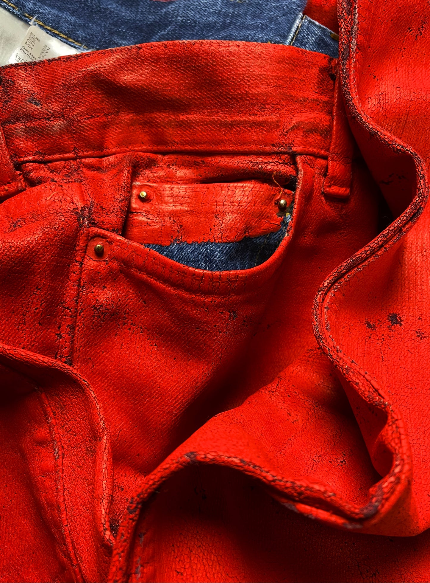 2004 Maison Margiela x H&M Painted Fade Red Denim.