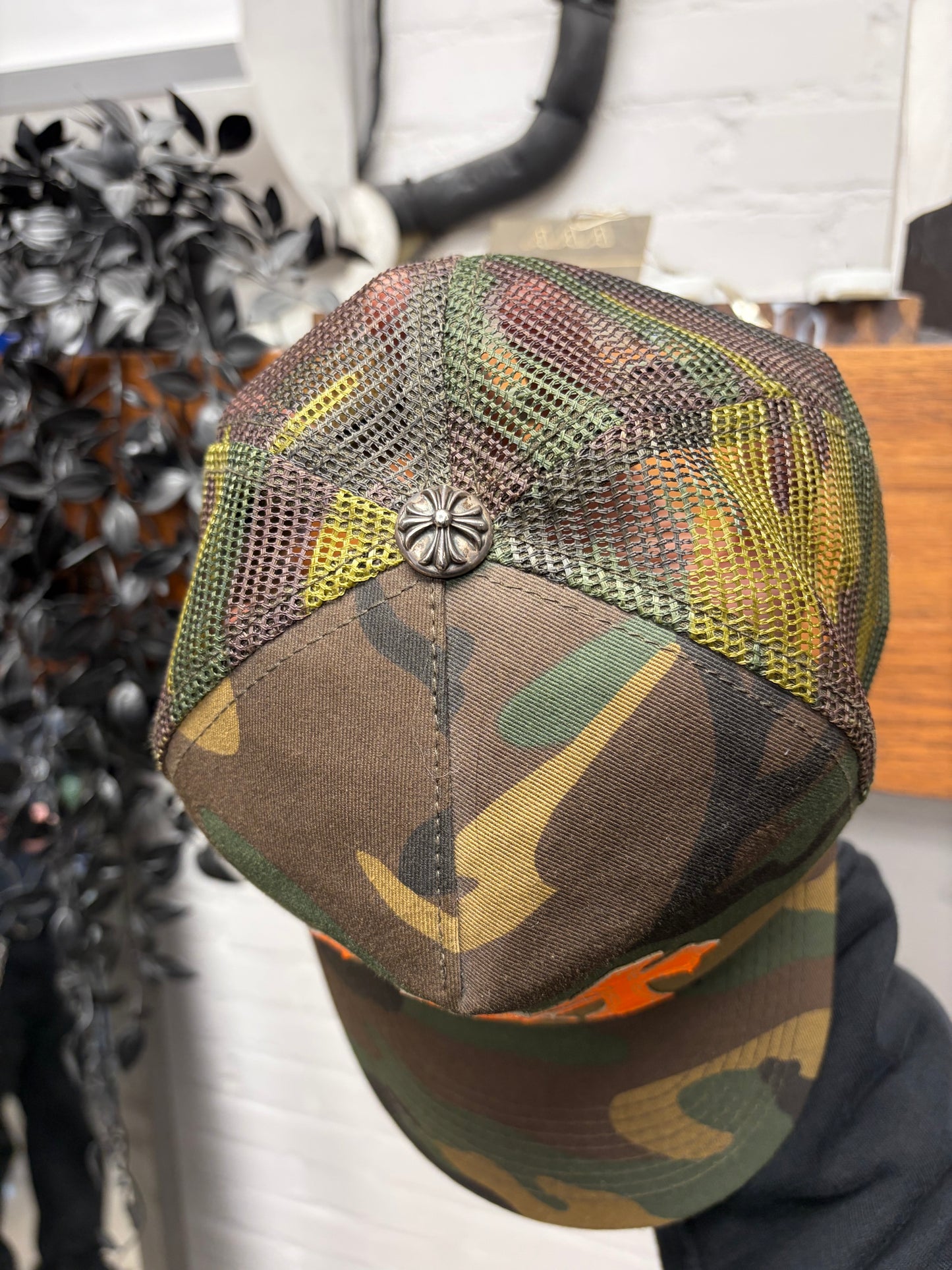 Chrome Hearts Orange ‘Cemetery’ Leather Cross Patch Camo Trucker Hat