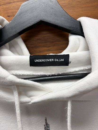 Undercover ‘Fallen Man’ Arrow Rain White Graphic Hoodie