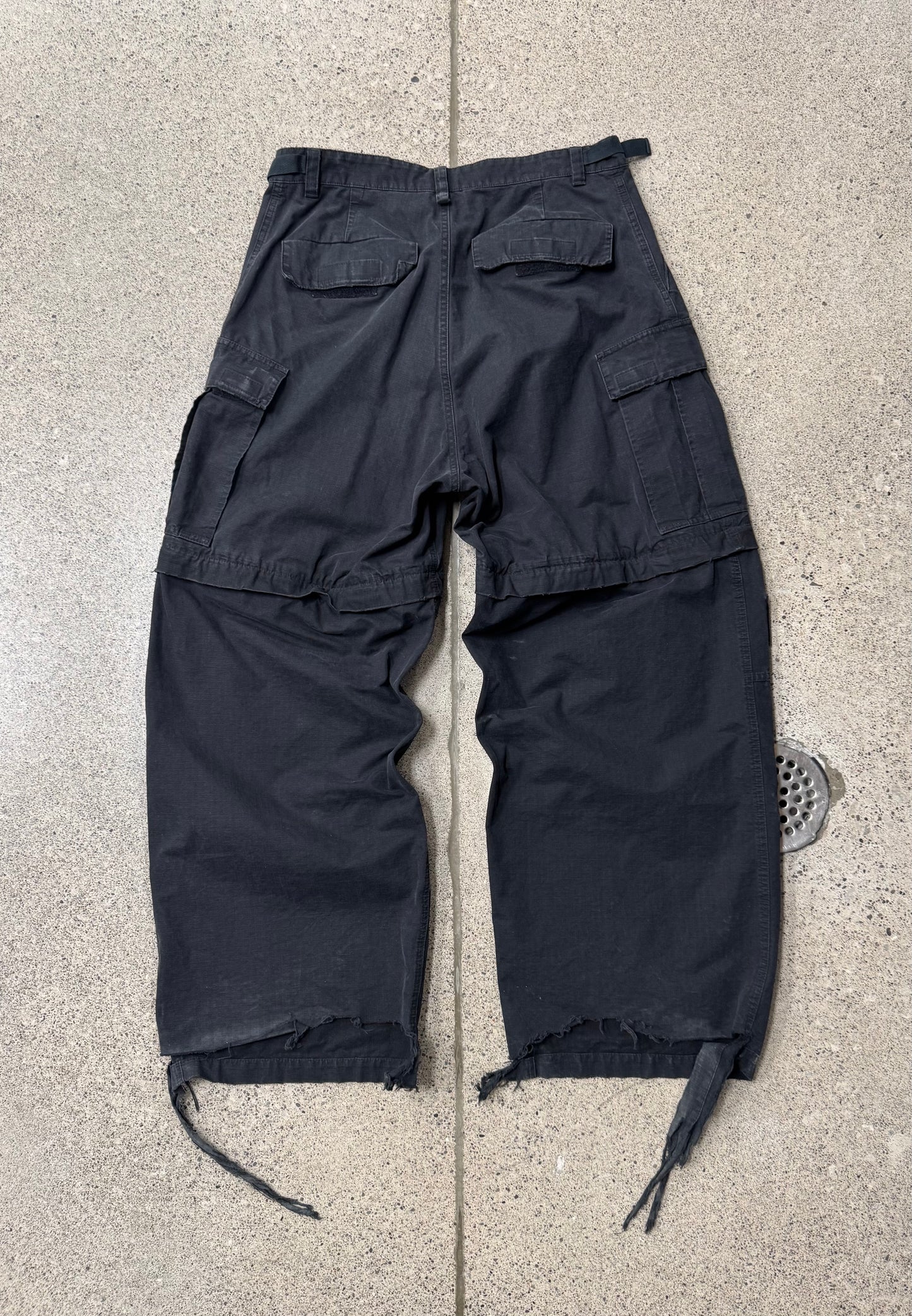 AW2023 Balenciaga Distressed Convertible Black Cargo Pants