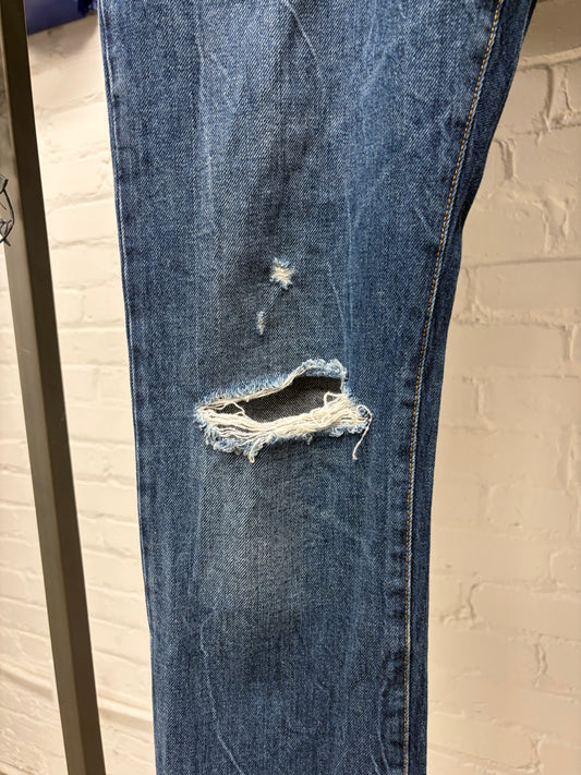 2018 Saint Laurent ‘D02’ Distressed Blue Skinny Jeans