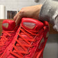 Raf Simons ‘Ozweegos V2’ Red Low Top Sneakers
