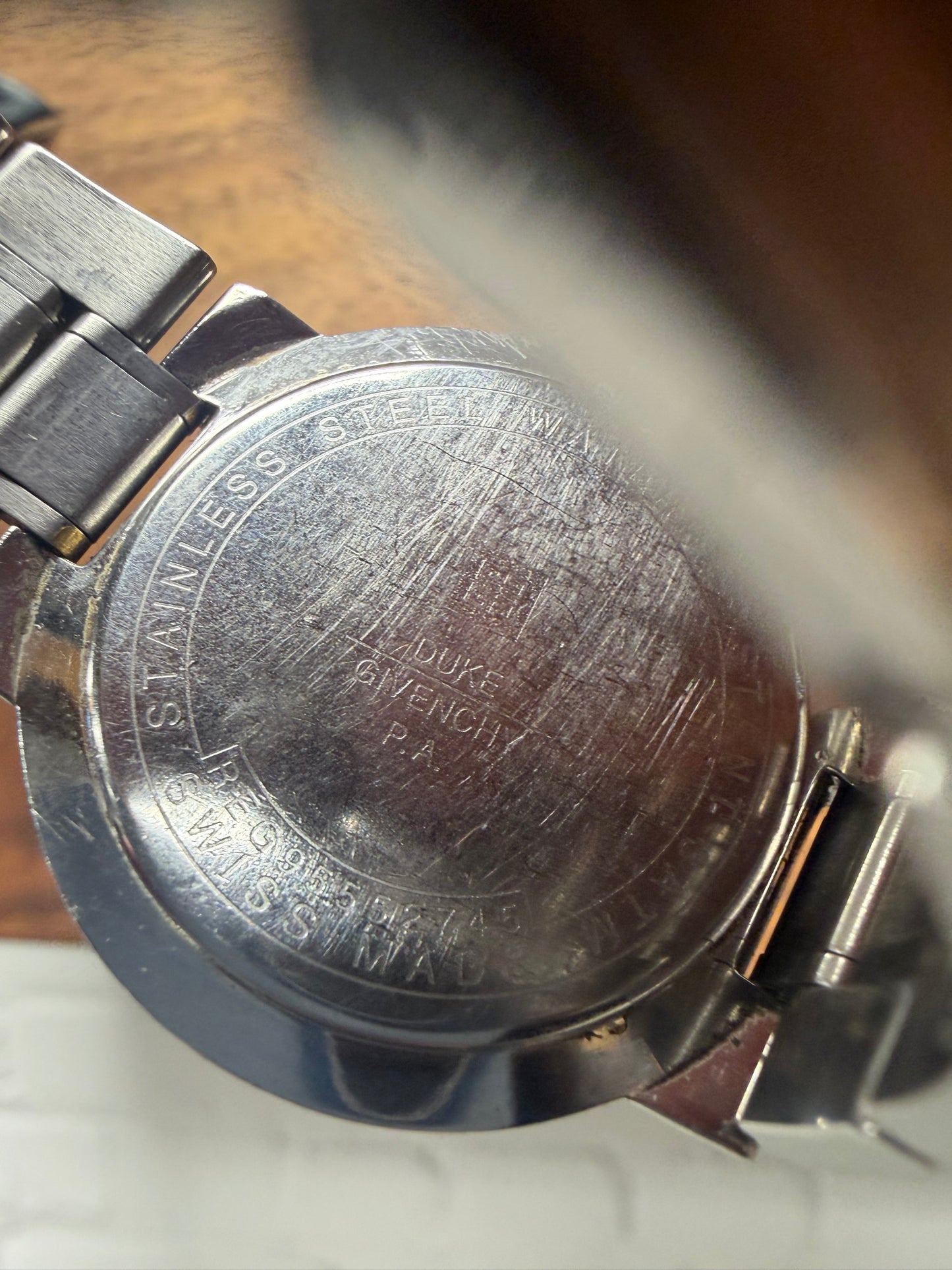 Vintage Givenchy Blue/Gold Dial Silver Analog Watch