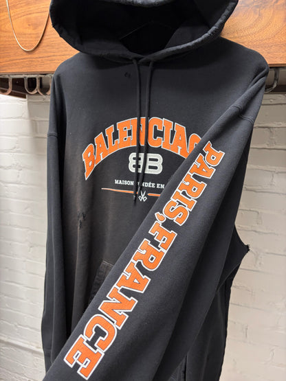 2021 Balenciaga Distressed Cotton ‘Paris’ Black/Orange Logo Hoodie