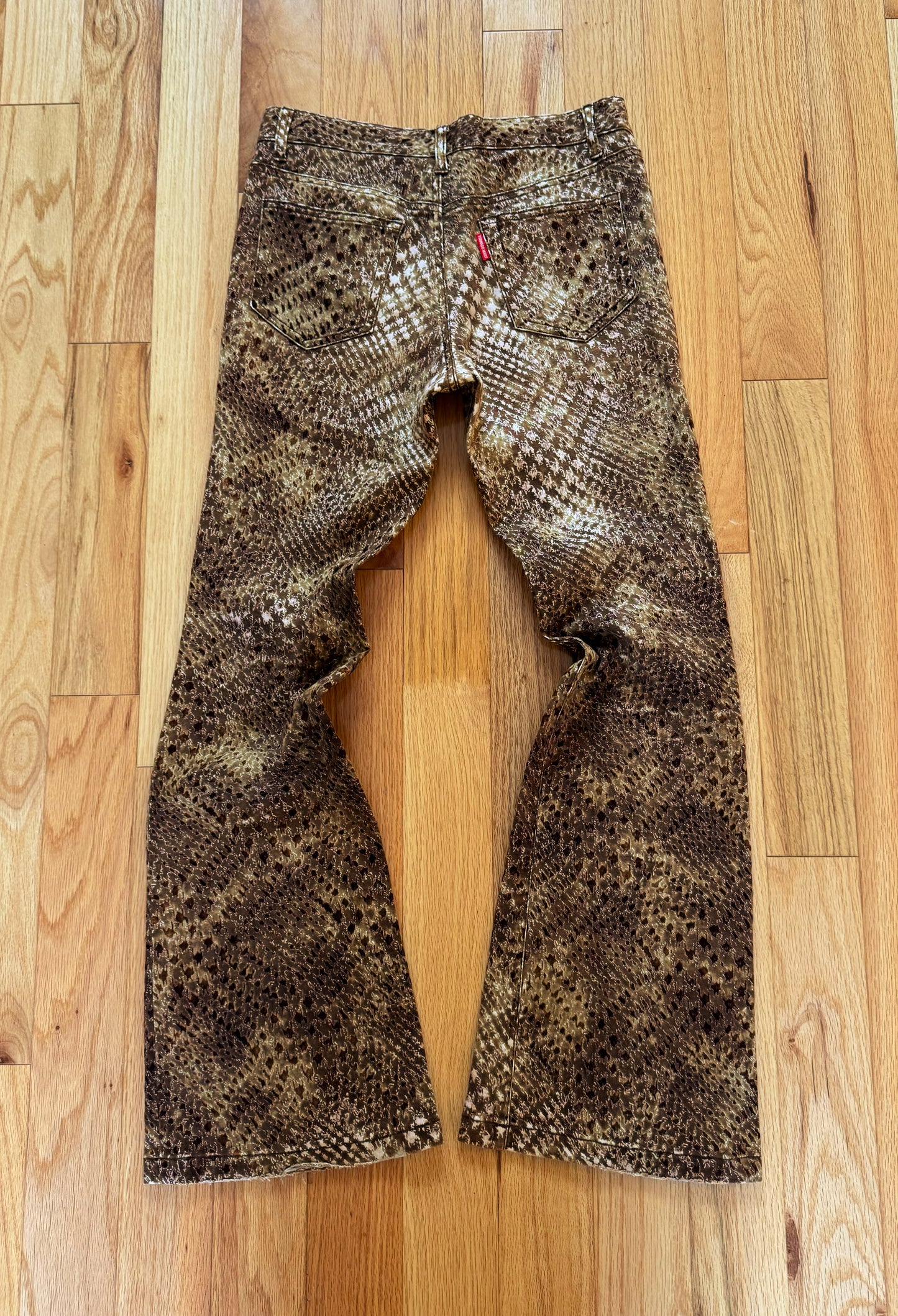 Tornado Mart Snakeskin Print Flared Leg Denim