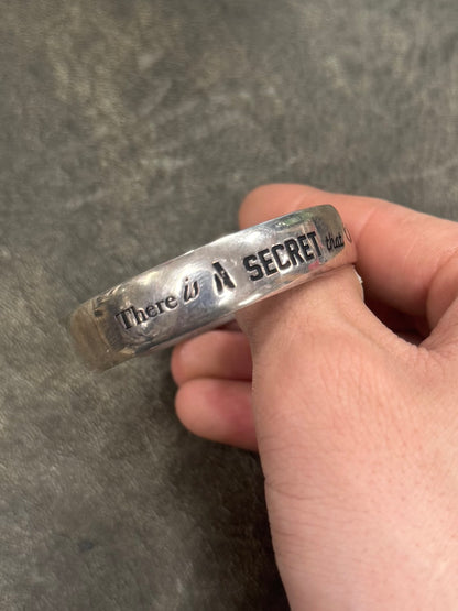 Undercover ‘Secrets’ Silver Bangle Bracelet