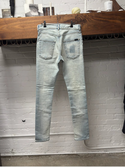 2021 Saint Laurent ‘D02’ Light Wash Distressed Skinny Jeans