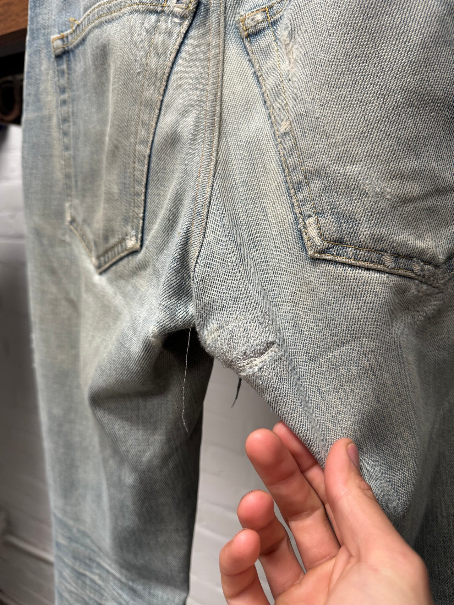 Saint Laurent ‘D02’ Distressed Light Wash Blue Denim