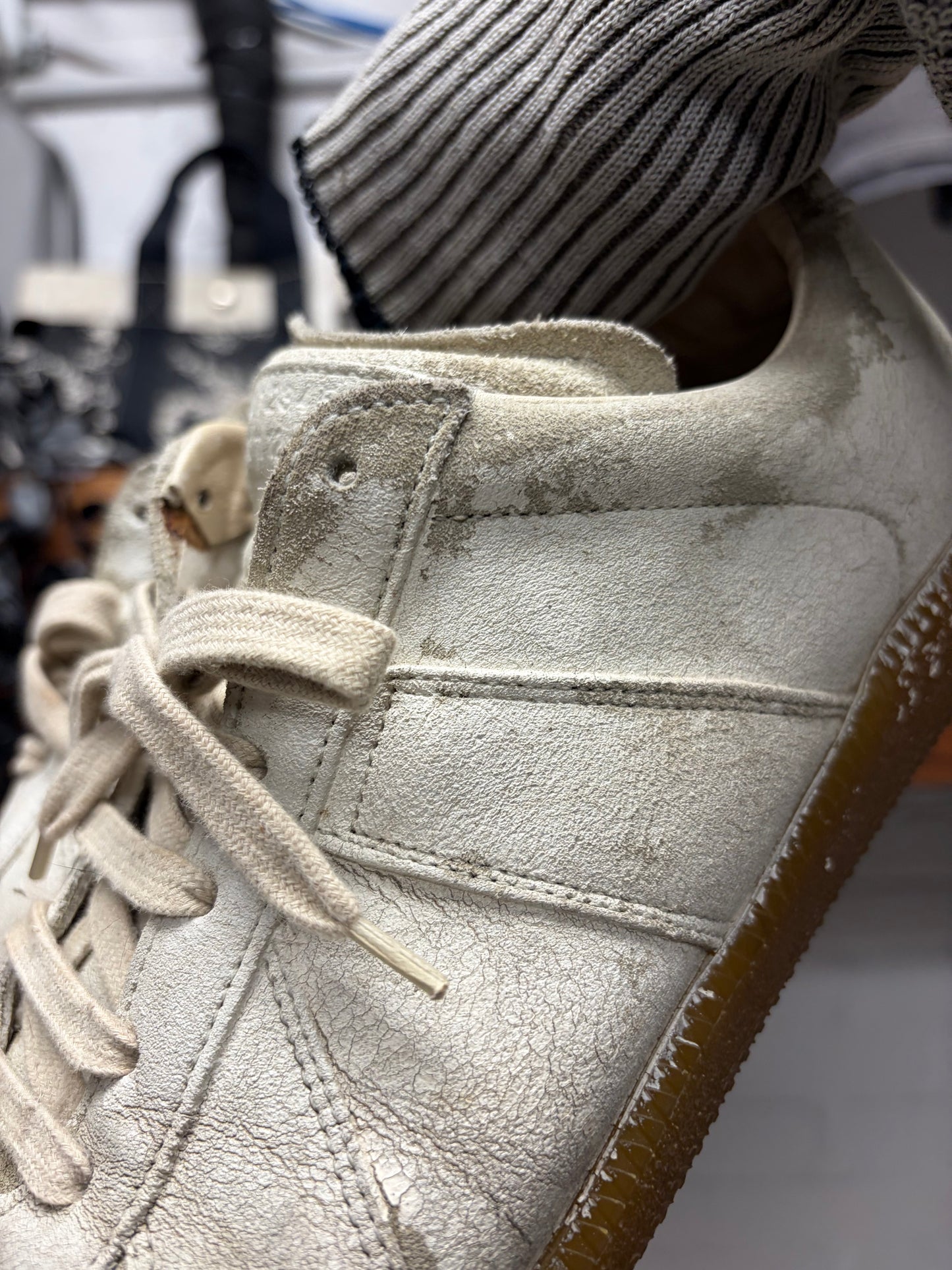 Maison Margiela ‘G.A.T.’ Paint Coated White Leather Low Top Sneakers
