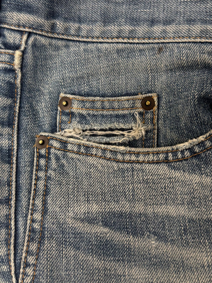 Saint Laurent ‘D02’ Distressed Blue Skinny Jeans