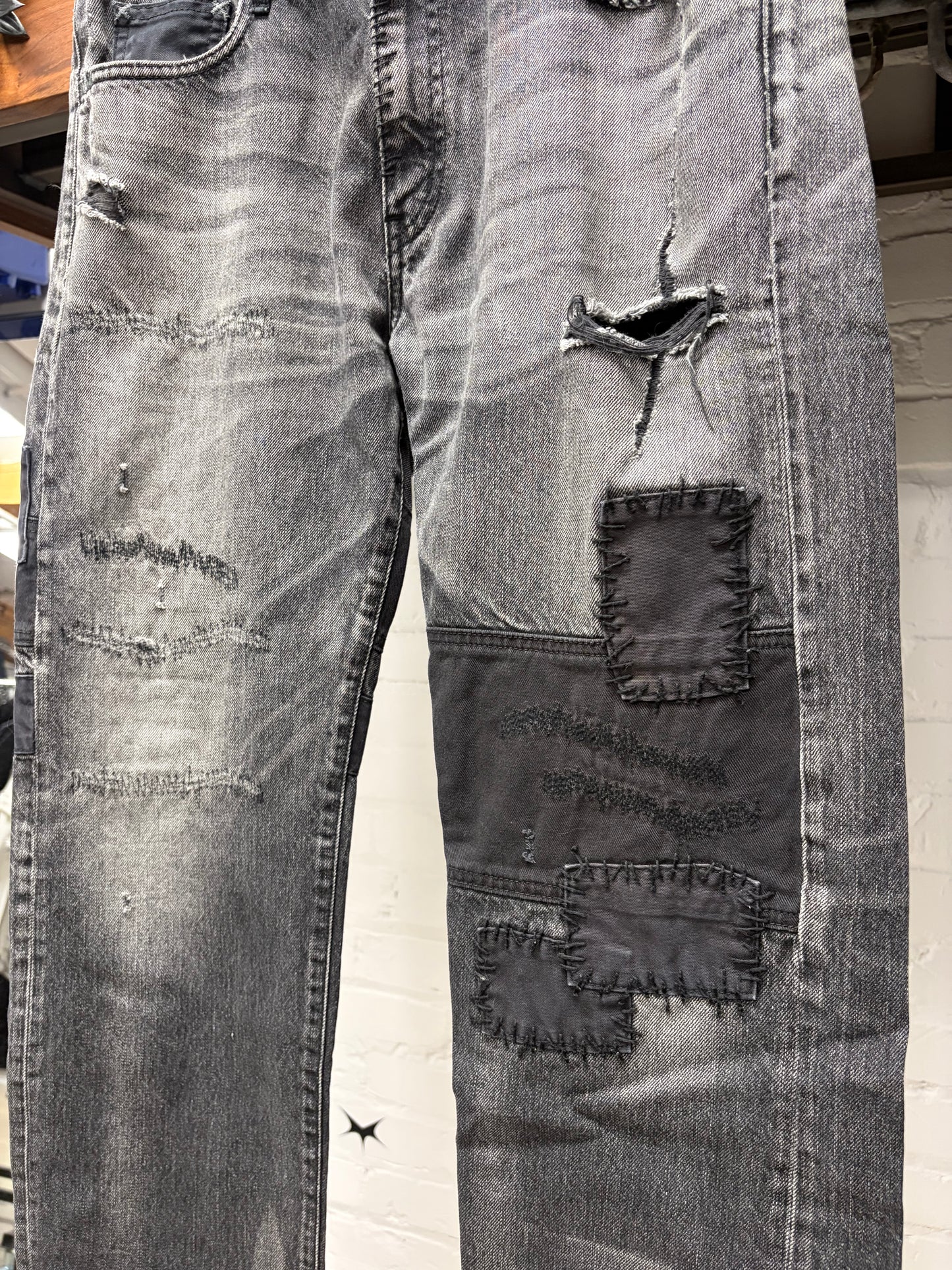 Neighborhood Patchwork Distressed Black Bootcut Denim