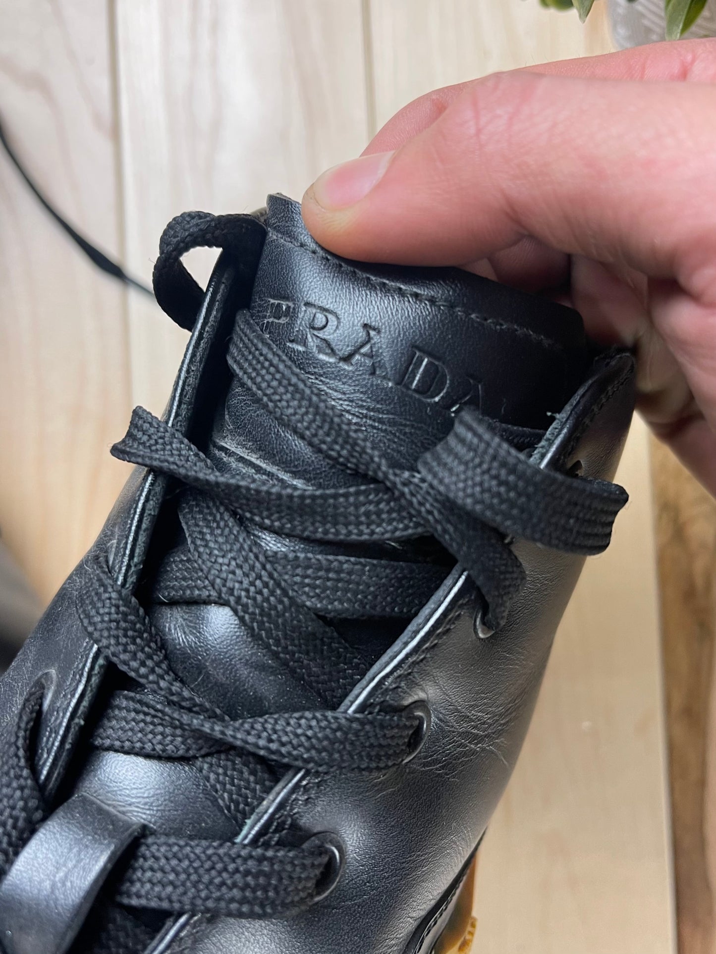 Prada Sport High Top Black Leather Sneakers