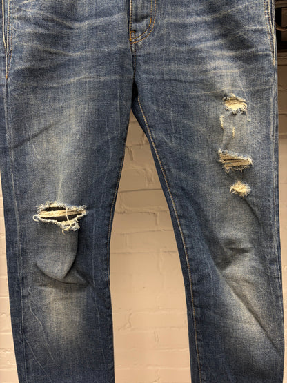 2018 Saint Laurent ‘D02’ Distressed Blue Skinny Jeans