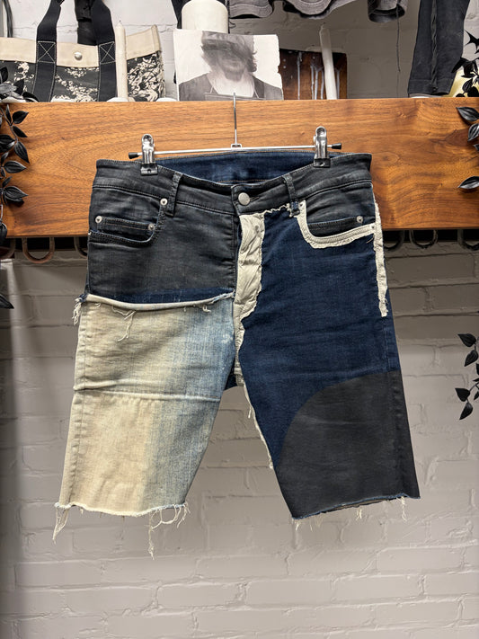 SS2019 Rick Owens ‘Babel’ Reconstructed Black Wax Cutoff Denim Shorts