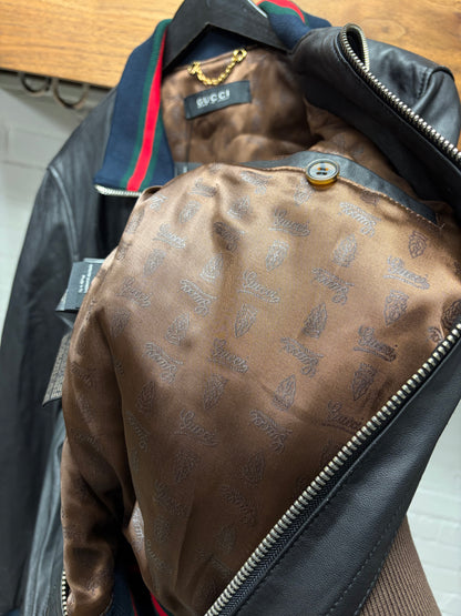 2000s Gucci Embossed ‘Cursive Logo’ Leather Jacket with Stripe Branded Ribbing