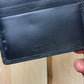 Jean Paul Gaultier Pierced Leather Bifold Wallet