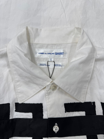 Comme Des Garçons Shirt ‘Free the World’ Painted Button Down Shirt.