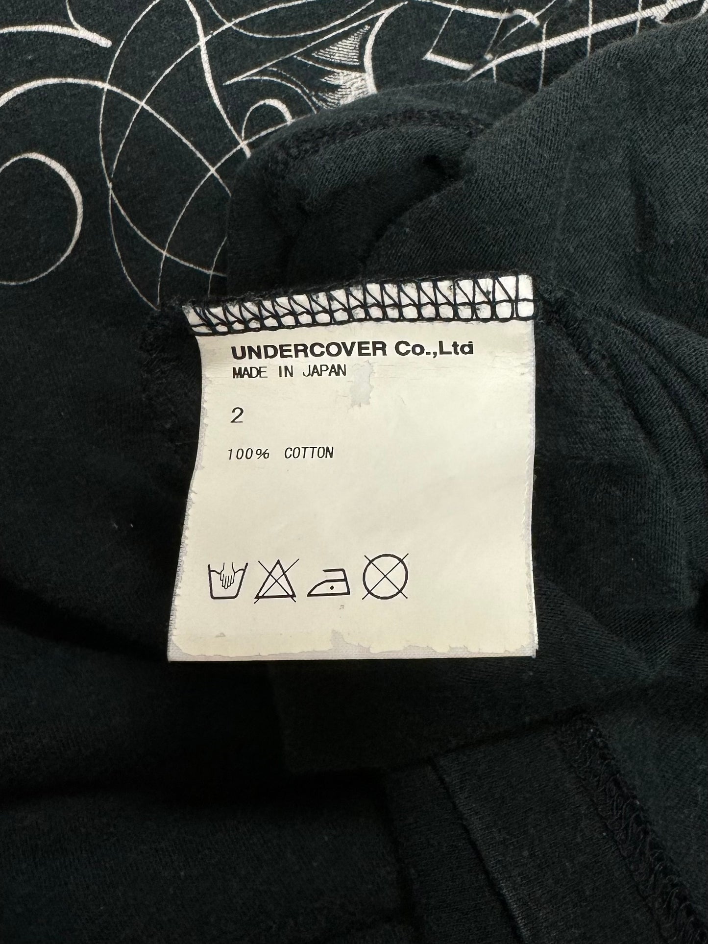 SS2010 Undercover ‘Less but Better’ Black Graphic T-Shirt