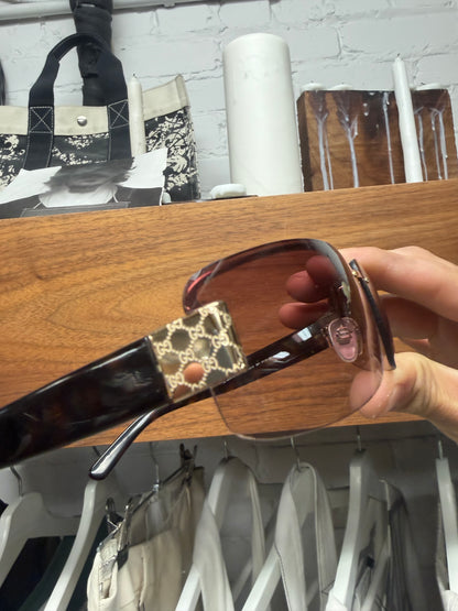Gucci ‘Guccisima’ Purple Tinted Rimless Sunglasses