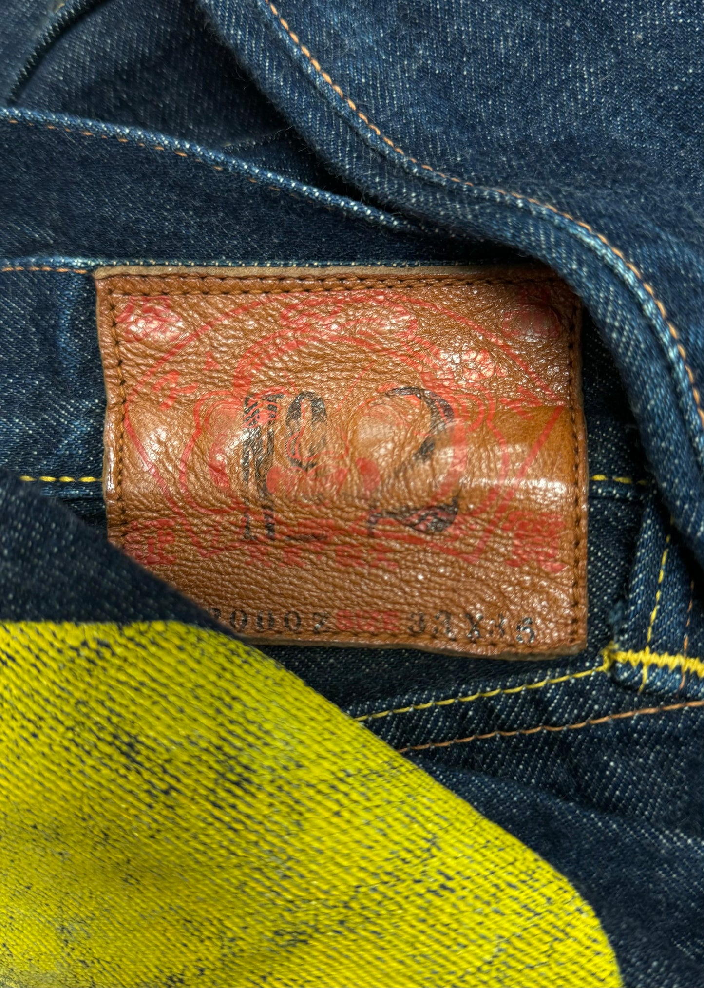 2000s Evisu Hand Painted Yellow Logo Raw Selvedge Denim