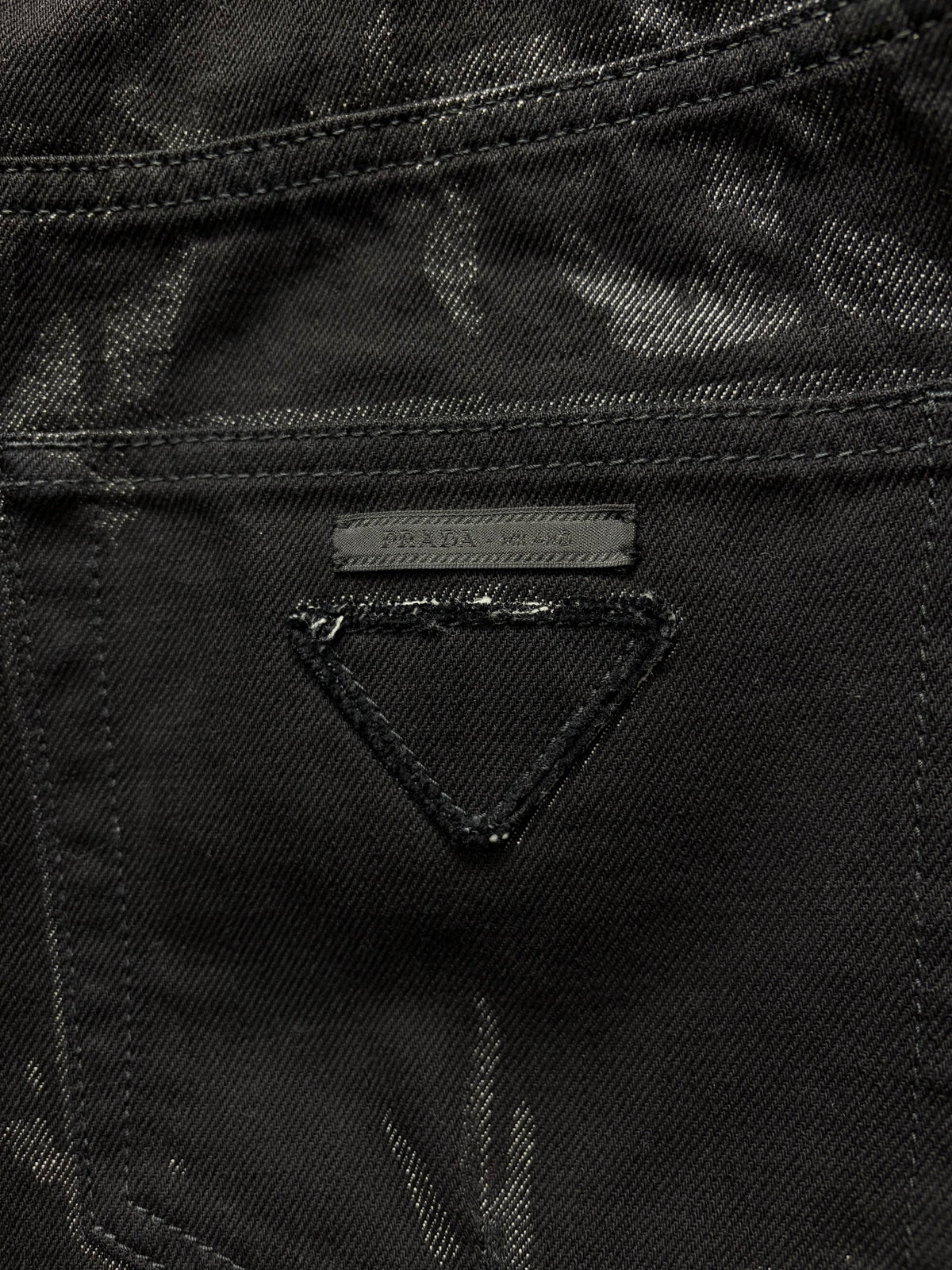 Prada Waxed Black Coated Skinny Jeans with Saffiano Patch Logo