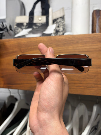 Gucci ‘Guccisima’ Purple Tinted Rimless Sunglasses