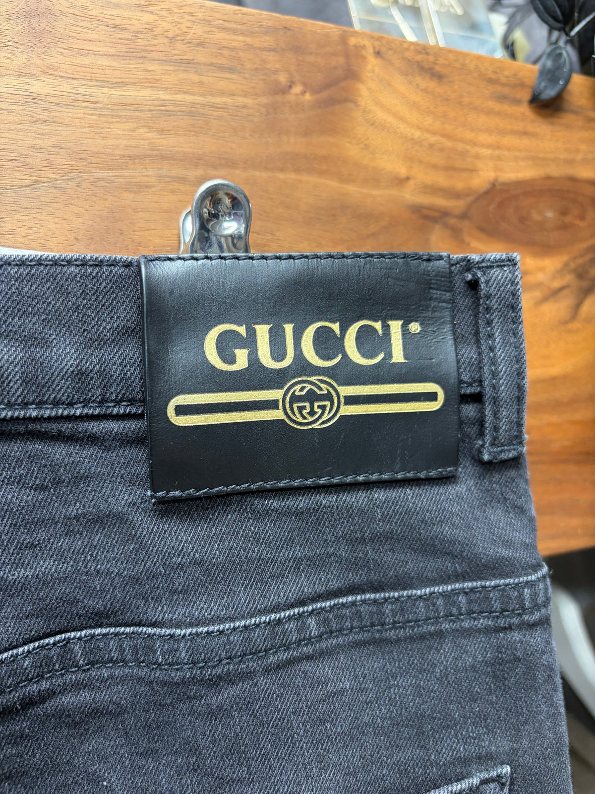 Gucci Faded Black Skinny Jeans with Leather Jacron Patch